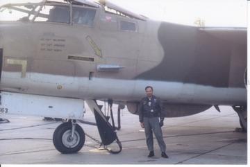 Wolfgang Samuel standing by airplane
